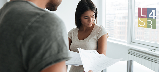 A married couple are concerned about their taxes.